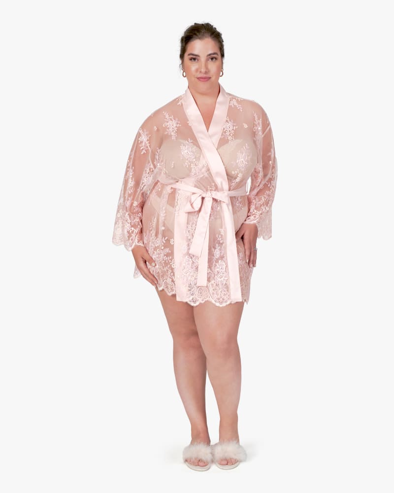 Front of a model wearing a size 1X Darling Cover-Up in Petal Pink by Montelle. | dia_product_style_image_id:184651
